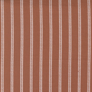 May include: A close-up of a fabric with a brown background and white vertical stripes. The fabric has a subtle texture.