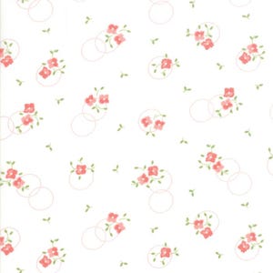 May include: White background with a repeating pattern of small pink flowers, green leaves, and dotted pink circles. The floral design is scattered across the surface, creating a delicate and feminine aesthetic.
