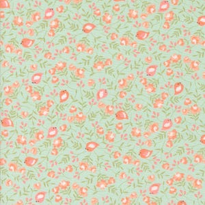 May include: A fabric with a repeating pattern of small, peach-colored birds and flowers on a light green background. The design includes green leaves and pink berries, creating a cheerful, nature-inspired print.