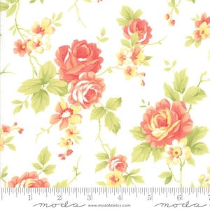 May include: White fabric with a repeating floral pattern. The design features coral and yellow roses, small yellow flowers, and green leaves on a white background. The fabric has a vintage, romantic aesthetic.