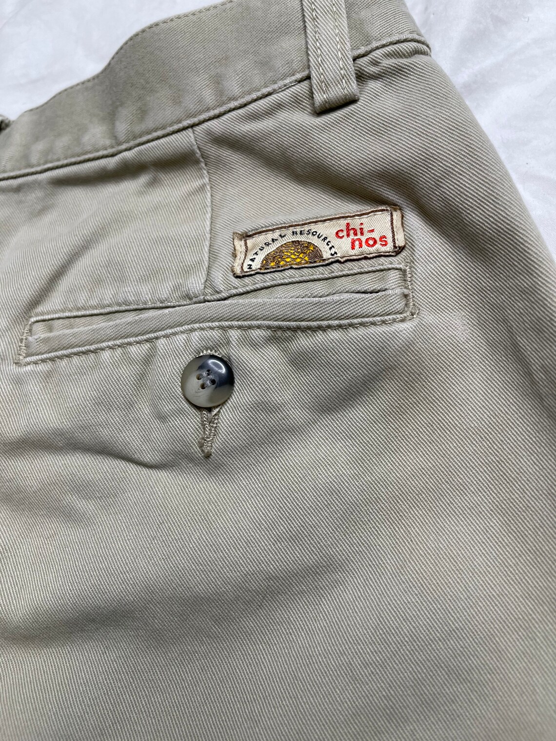 cream chinos blue shirt