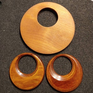 3 Wood Focal Beads. Great for Necklaces or Craft Projects. Smaller are Polished, Larger one is Stained Raw Wood.
