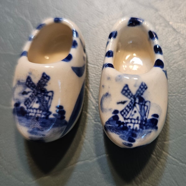 One Set or Pair Little Porcelain Dutch Shoes. Blue and White Glazed Ceramic Clogs. Hole on Inside for Hanging.