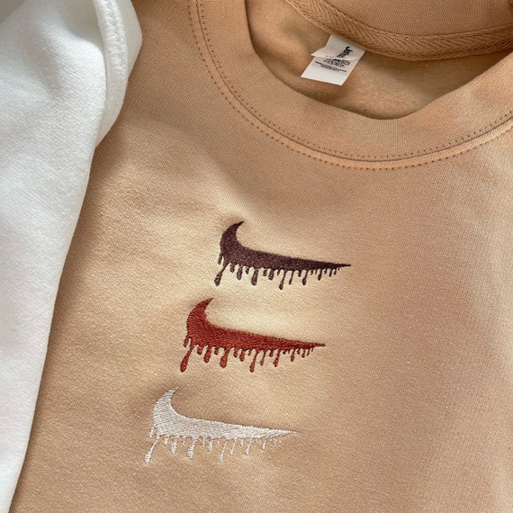 nike drip crewneck