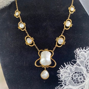 Liberty, gold Cymric arts and crafts necklace set with blister pearls