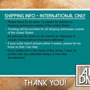 May include: A rectangular teal sign with white text titled SHIPPING INFO - INTERNATIONAL ONLY, detailing delivery timelines, tracking, and carrier policies. A small square logo with the letters AEDM is in the bottom right corner.