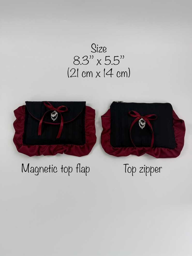 May include: Two black and burgundy clutch bags. One has a magnetic top flap, the other a top zipper. Each bag is 8.3" x 5.5" (21 cm x 14 cm) and features a burgundy ruffle trim, a bow, and a decorative emblem.