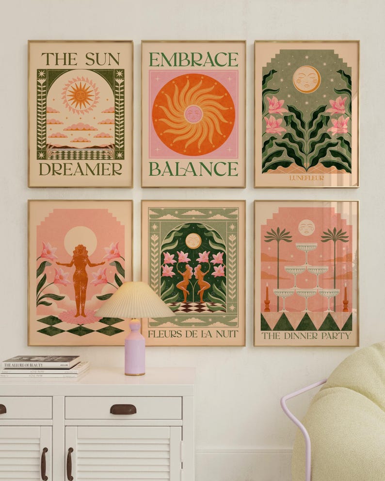 May include: Set of six illustrated prints with a bohemian aesthetic. Each print features a different design with a moon, sun, or flowers. The prints are framed in gold and have a light pink, orange, and green colour scheme. The text on the prints includes "The Sun Dreamer", "Embrace Balance", "Luneffur", "Fleurs de la Nuit", and "The Dinner Party".