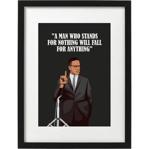 May include: Framed art print with a portrait of a man in a suit, glasses, and tie, raising his index finger. The print includes the quote: "A MAN WHO STANDS FOR NOTHING WILL FALL FOR ANYTHING" in white text on a black background.