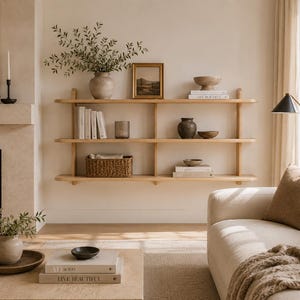 Wall shelf displaying books, decorative objects, and everyday storage to demonstrate practical capacity.