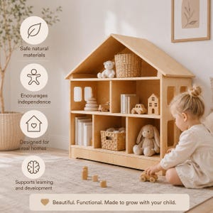 Wooden toy and book organizer shaped like a dollhouse for toddlers and Montessori play spaces