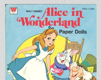 May include: A vintage Whitman paper doll book featuring Alice in Wonderland. The cover features illustrations of Alice, the White Rabbit, the Mad Hatter, and the Cheshire Cat. The book is titled "Alice in Wonderland Paper Dolls" and includes the copyright date 1976.