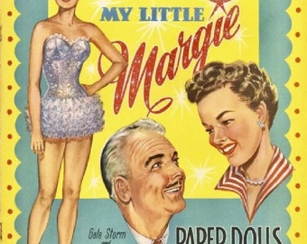 Może przedstawiać: Zestaw papierowych lalek z Gale Storm i Charlesem Farrellem, gwiazdami serialu telewizyjnego "My Little Margie". Okładka przedstawia kolorową ilustrację aktorów w ich charakterystycznych rolach.