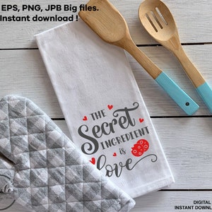 Puede incluir: Toalla de cocina blanca con el texto "The Secret Ingredient is Love" en fuente cursiva negra con un gráfico de mariquita roja. El texto está rodeado de pequeños corazones rojos.