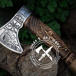 Nordic Viking axe with hand forged carbon steel blade and engraved wood handle  unique gift for special occasions like birthdays or anniversaries