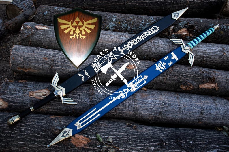 May include: A wooden shield with a gold emblem and two decorative swords, one black and one blue, with silver accents. The swords and shield are displayed on a background of stacked logs. The image includes the text "AMAR'S ART WORK MOTIVATE".