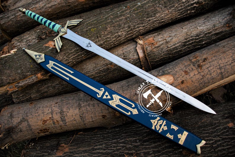May include: A silver sword with a blue and gold handle and a matching blue sheath, resting on a bed of wooden logs. The sword features a stylized design with gold accents and a triangular emblem on the blade. The sheath has gold decorative elements.