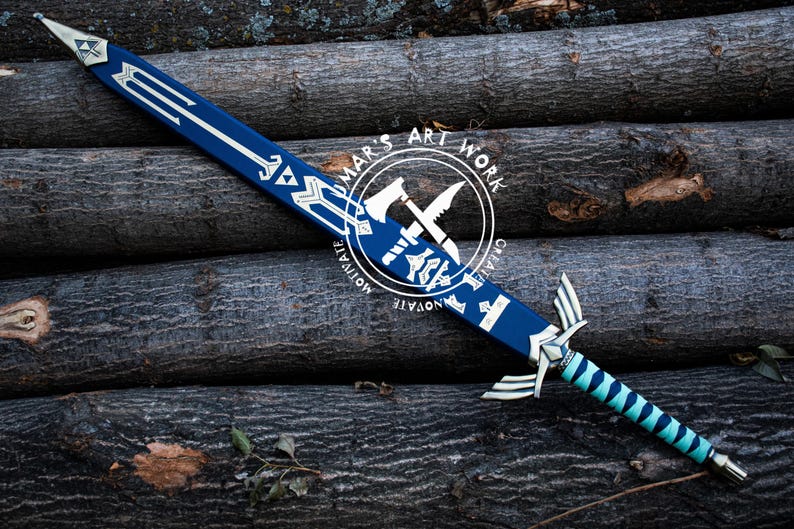 May include: A blue and silver decorative sword with a teal and silver handle. The sword features a design on the blade and handle. The image includes the text "MAR'S ART WORK" in a circular logo.