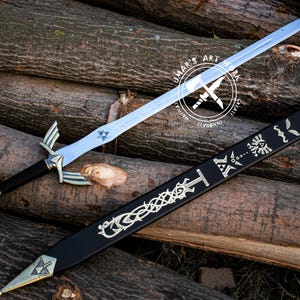 May include: A silver-bladed sword with a black handle and gold accents, resting on a pile of logs. The sword has a decorative hilt and a sheath with intricate designs. The blade has a blue triangle symbol.