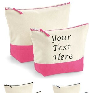 May include: Two sets of zippered canvas pouches. The first set is pink and white, the second set is black and white, and the third set is navy blue and white. The pouches are all the same size and shape, and they have a zipper closure. The pouches are perfect for storing small items, such as makeup, toiletries, or jewelry.