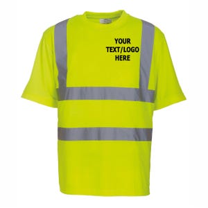 May include: High-visibility yellow short-sleeved t-shirt with reflective silver stripes and accents. The shirt features the text "YOUR TEXT/LOGO HERE" in black. This workwear is designed for safety and visibility.