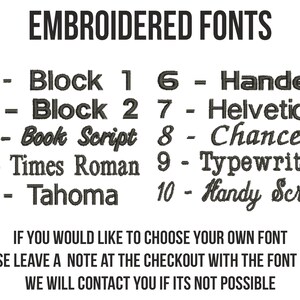 May include: A list of 10 embroidered fonts, including Block 1, Block 2, Book Script, Times Roman, Tahoma, Handel, Helvetica, Chancery, Typewriter, and Handy Script. The text reads "Embroidered Fonts" and "If you would like to choose your own font, please leave a note at the checkout with the font name. We will contact you if it's not possible."