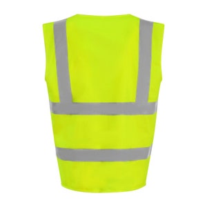 May include: A bright yellow safety vest with reflective silver stripes. The vest has a V-neck and is sleeveless.