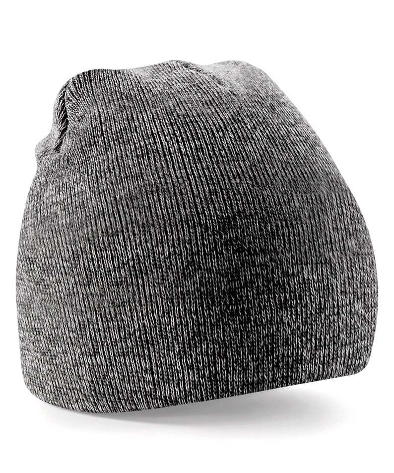 May include: A gray beanie with a slouchy fit. The beanie is made of a soft, knitted fabric.