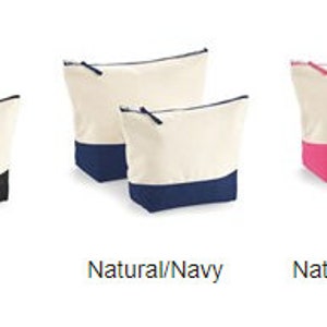 May include: Three canvas zippered pouches with a natural colored top and a colored bottom. The pouches are black, navy blue, and pink.