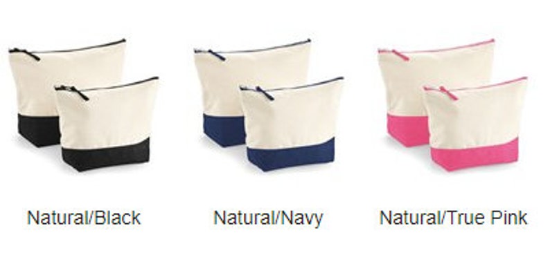 May include: Three canvas zippered pouches with a natural colored top and a colored bottom. The pouches are black, navy blue, and pink.