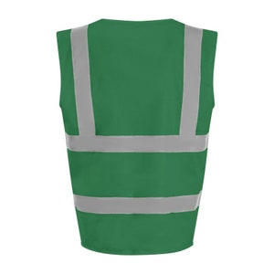 May include: Green safety vest with reflective silver stripes. The vest has a V-neck and is sleeveless.
