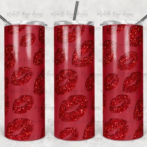 May include: A set of three red glitter lip print tumblers with silver straws. The tumblers have a repeating pattern of red glitter lips on a solid red background. The tumblers are cylindrical and have a silver lid.