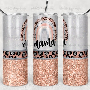 May include: A stainless steel tumbler with a rose gold glitter finish. The tumbler features a black and white leopard print design with a rainbow and the word "mama" in a white script font.