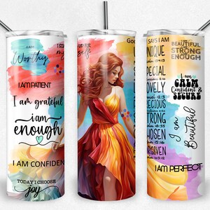 May include: Three stainless steel tumblers with colorful watercolor designs and inspirational quotes. The quotes include "I am worthy", "I am grateful, I am enough", and "I am beautiful, I am perfect".