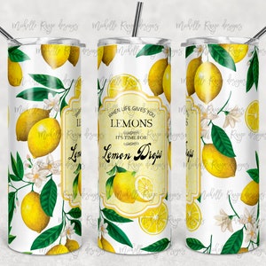 Puede incluir: Un vaso blanco con un diseño de limón y el texto "Cuando la vida te da limones, es hora de tomar gotas de limón".