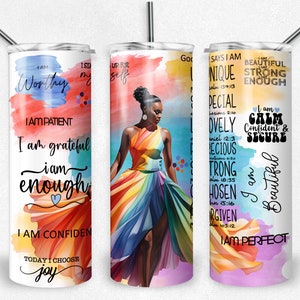 May include: Three stainless steel tumblers with colorful watercolor designs and inspirational quotes. The tumblers feature a woman in a rainbow dress, the words "I am worthy", "I am grateful", "I am enough", "I am confident", "Today I choose joy", "God says I am unique", "I am special", "I am lovely", "I am precious", "I am strong", "I am chosen", "I am forgiven", "I am perfect", "I am beautiful", "I am calm, confident & secure".