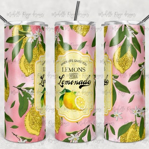 Puede incluir: Un vaso rosa y dorado con un diseño de limón y el texto "When life gives you lemons make lemonade".