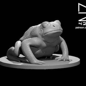 May include: A 3D printed model of a toad sitting on a round base. The toad is gray and has a textured surface.