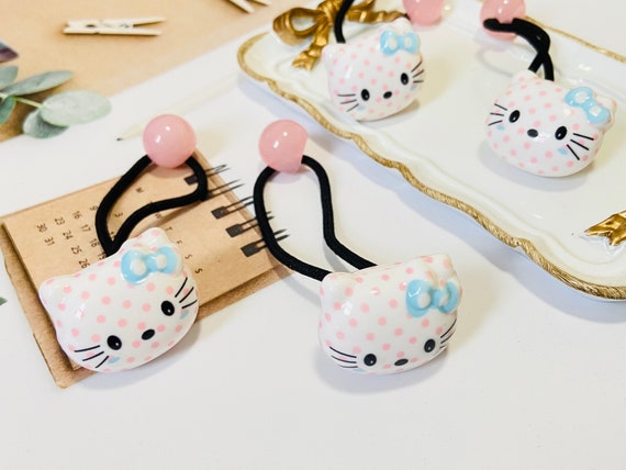 Cats and hair clearance ties