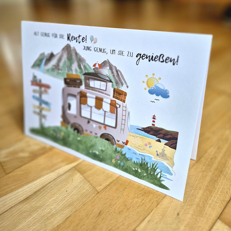 May include: A greeting card with a cartoon illustration of a camper van parked near a beach with a lighthouse. The card has text in German that reads "Old enough for retirement! Young enough to enjoy it!"