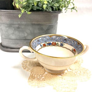 May include: A rustic wooden sign with the text "Welcome to our porch" in white lettering. The sign features a distressed finish and a simple, inviting design, perfect for outdoor decor.