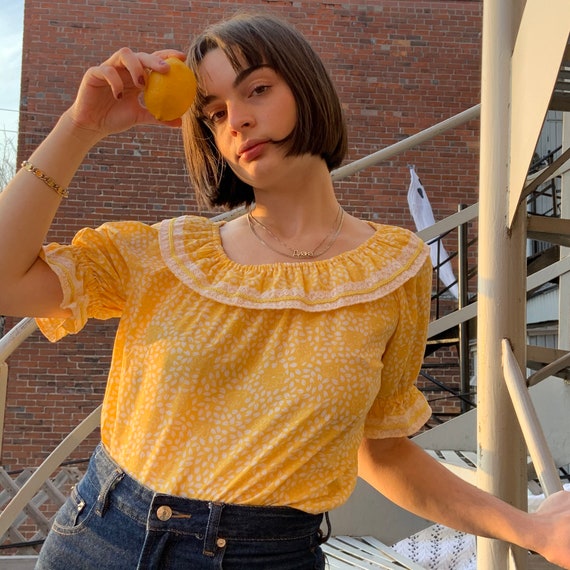 Yellow puff sleeve ruffle top