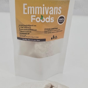 May include: A white resealable pouch with a label that reads "Emmivans Foods" and "100% Natural". The label also includes contact information and storage instructions. The pouch contains white rock-like pieces.