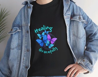 Wear your journey like a badge with our "Healing Gracefully" Unisex Heavy Cotton T-Shirt