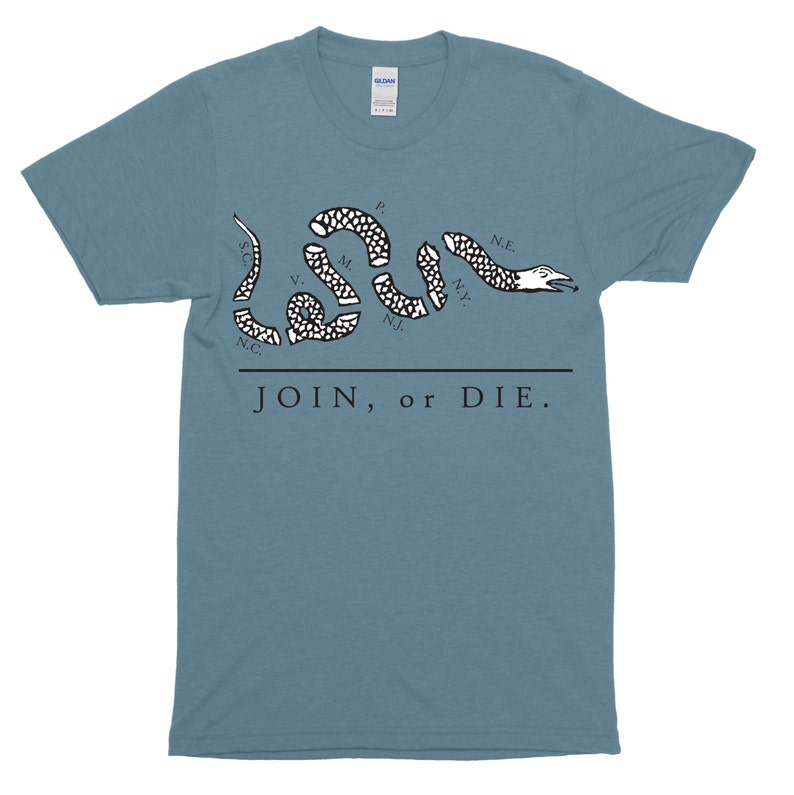 May include: A light blue t-shirt with a black and white image of a snake with the words "JOIN, or DIE." and the abbreviations of states on the snake.