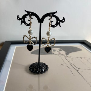 Cute Gold Bows with Black Hearts Dangle Earrings