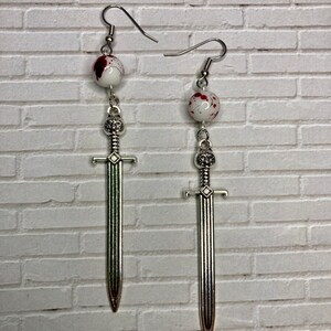Silver Sword Dangle Earrings with Blood Splatter Bead