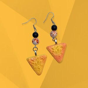 Dangling Chip Food Earrings with Orange, White, and Black Accent Beads