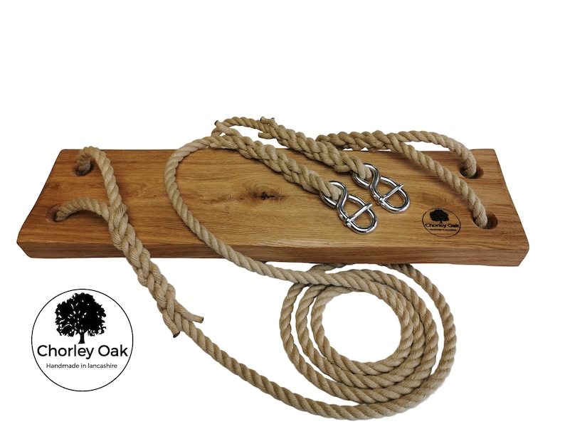 May include: A wooden swing set with natural rope and metal hooks. The swing is made of solid oak and has a natural finish. The rope is thick and durable, and the hooks are made of sturdy metal. The swing is perfect for adding a touch of rustic charm to any backyard.