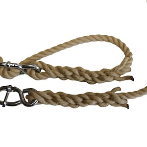 May include: Two brown ropes with silver metal clasps. The ropes are braided and have a loop at one end.